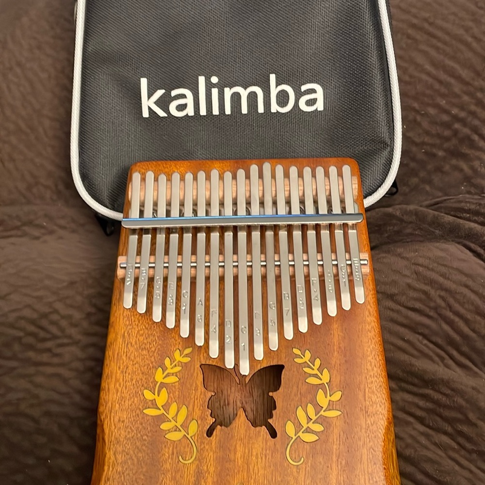 Kalimba NA & UM 17 key Thumb piano with butterfly inlay  new never used